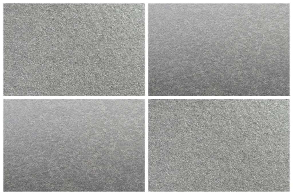 Vier-in-eins Vergleich geflammt gebürstete Oberfläche Nero Assoluto India oben links unten rechts und Zimbabwe oben rechts unten links